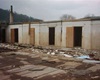 Areál "technických služeb" v ul. K Lázním před demolicí v roce 2006.